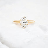 moissanite-1-33-ct-oval-cut-solitaire-handcrafted-yellow-gold-engagement-ring-gemfora